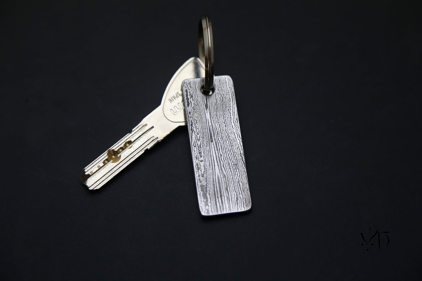 Keychain, Hand Forged Damascus. A Unique Gift for Metal Lovers, Craftsmanship and Traditional Forging